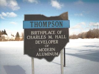 Sign commemorating Charles Martin Hall located south of town square.